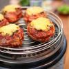 Stuffed potato skins baking on the Cobb cooker